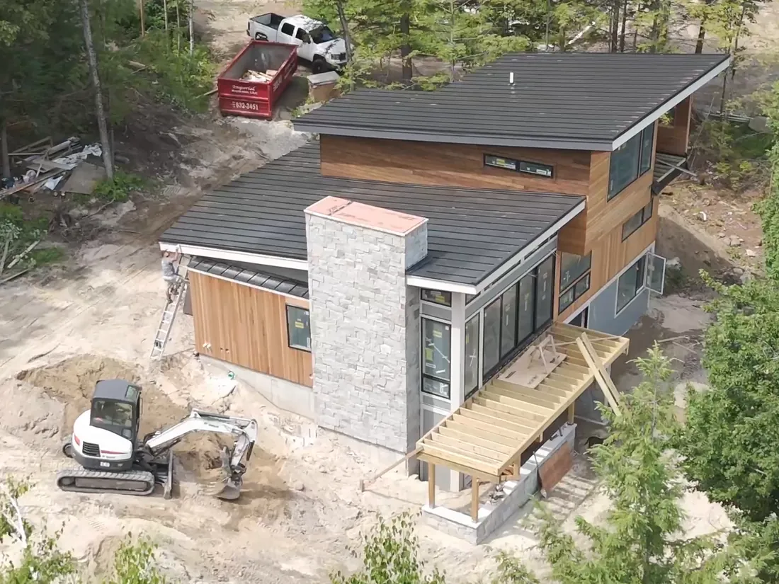 Aerial view of a modern home under construction by Schwanz Construction